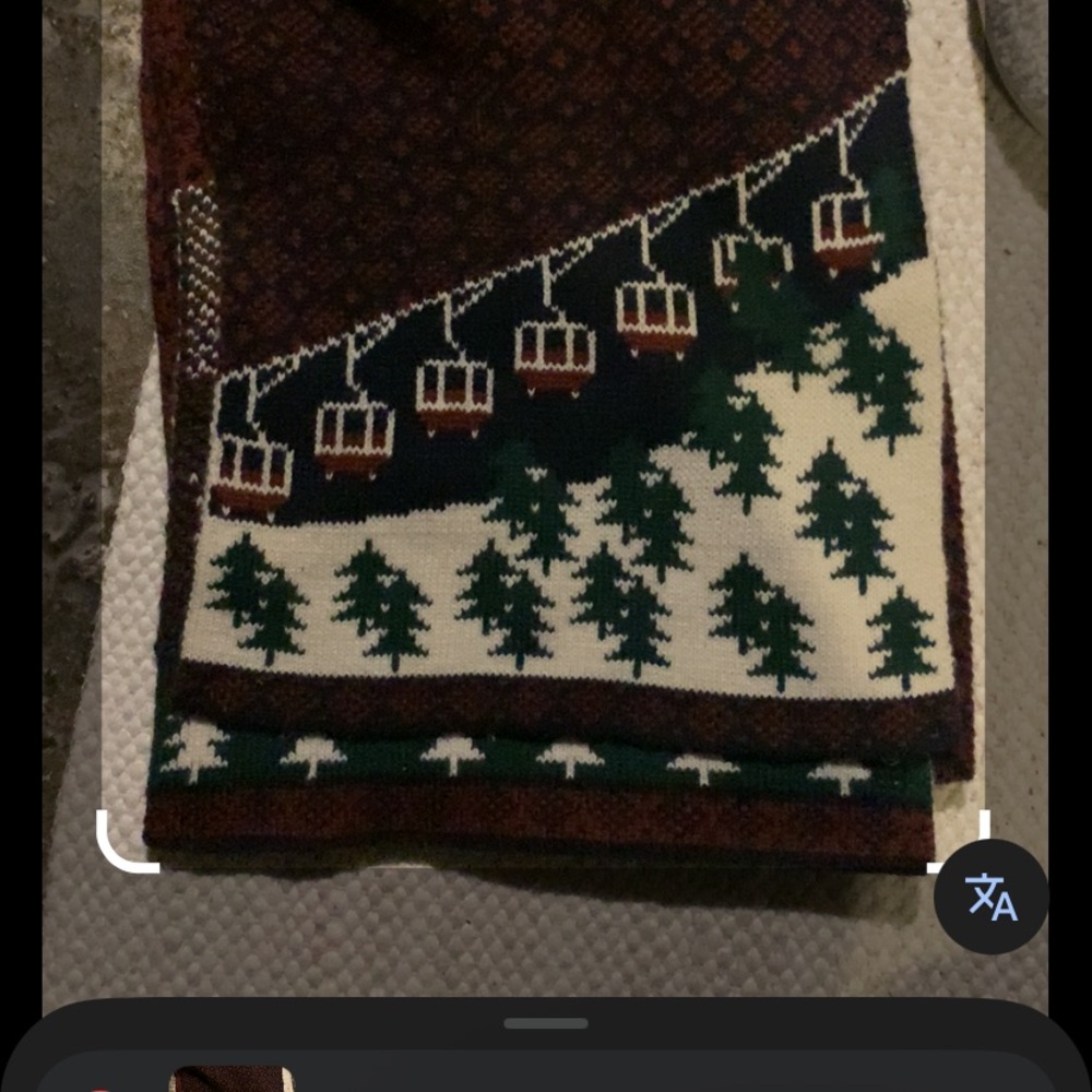 21 Men knit scarf featuring a distinct winter or ski-themed pattern